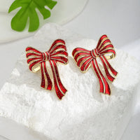 A Pair of Fashionable New Red Bow Earrings, Environmentally Friendly Alloy Dripping Oil Creative Earrings, Christmas Earrings